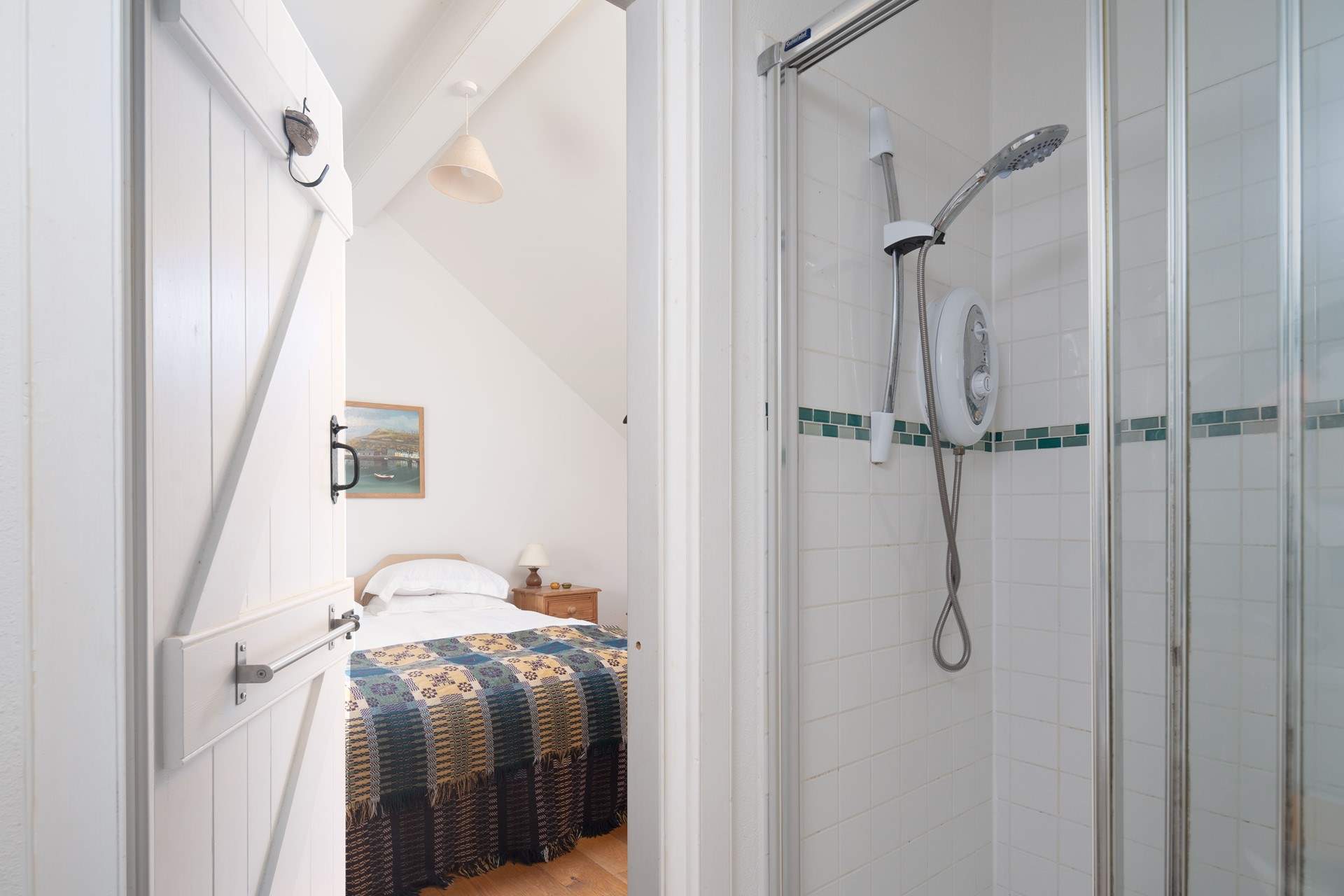 Two handy en suite bedrooms and a family bathroom. 