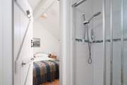 Two handy en suite bedrooms and a family bathroom.