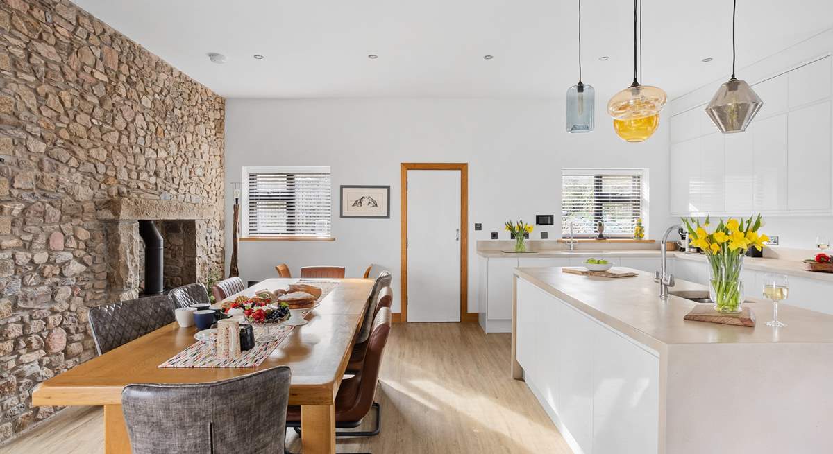 The kitchen and dining space has crisp, clean lines. 