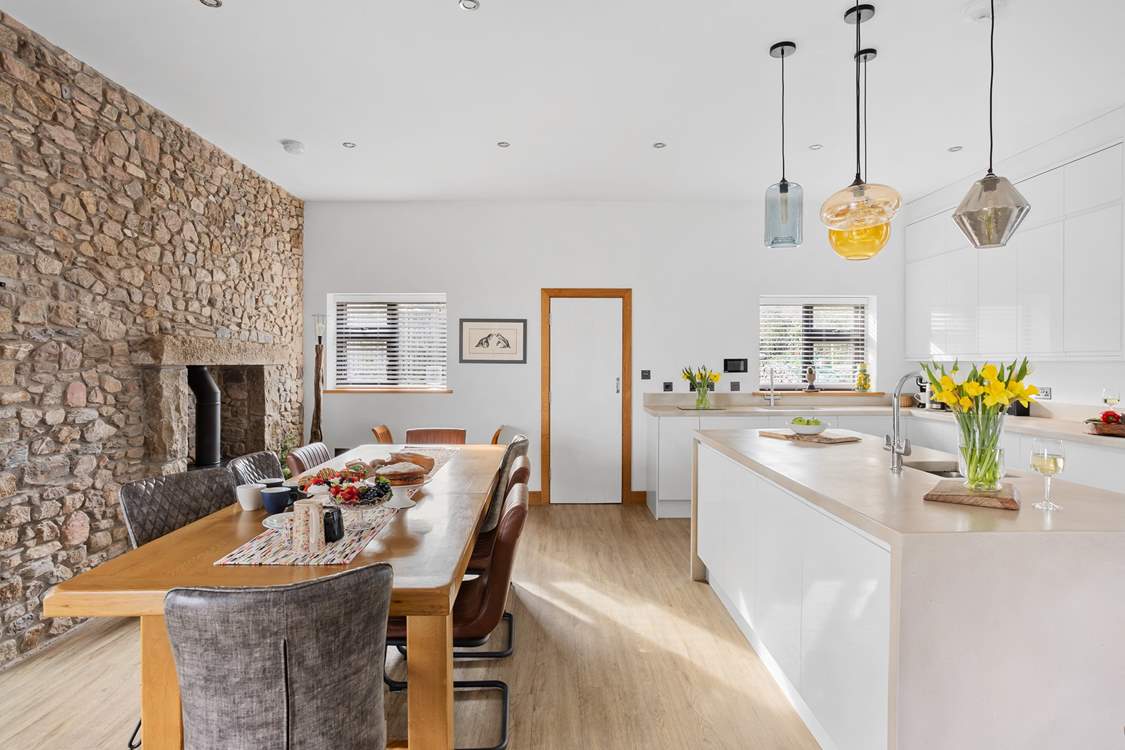 The kitchen and dining space has crisp, clean lines. 