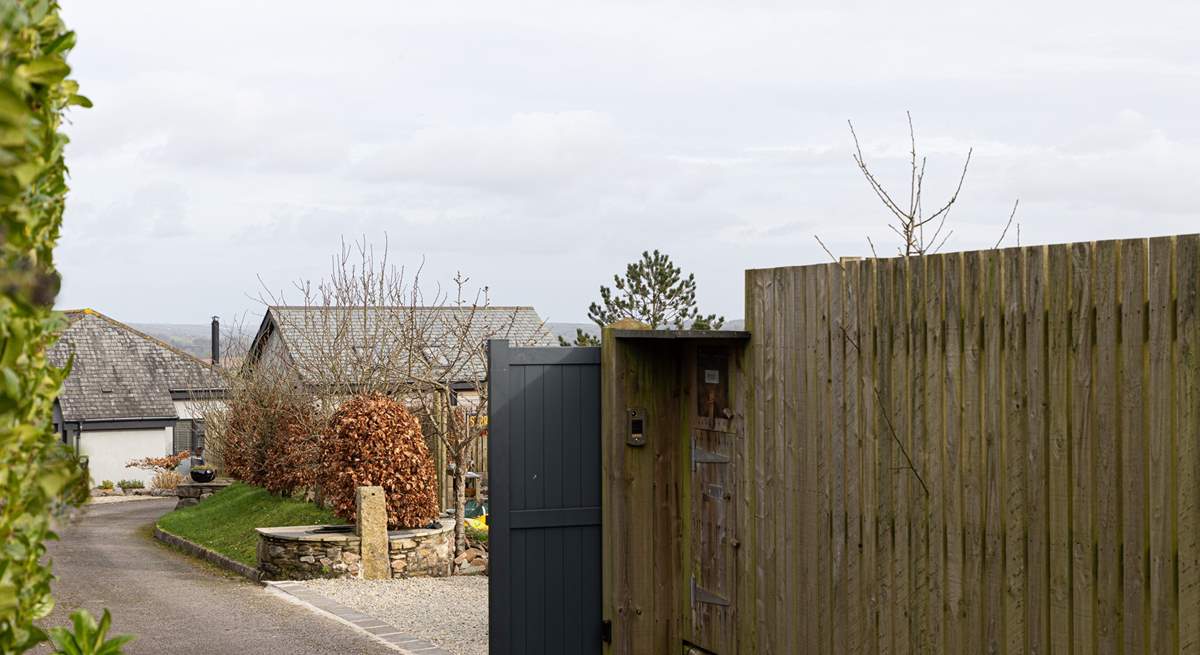 Head through the electric gate and down to The Pool House.