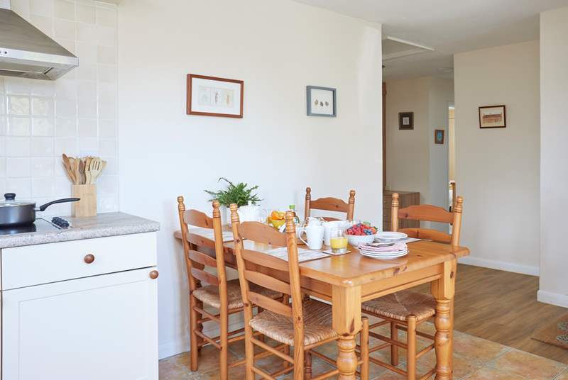 The bright open plan kitchen/dining area at Blakesley Cottage.