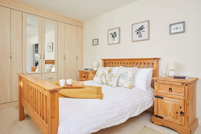 The main bedroom is very spacious and light, perfect for a spot of breakfast in bed..