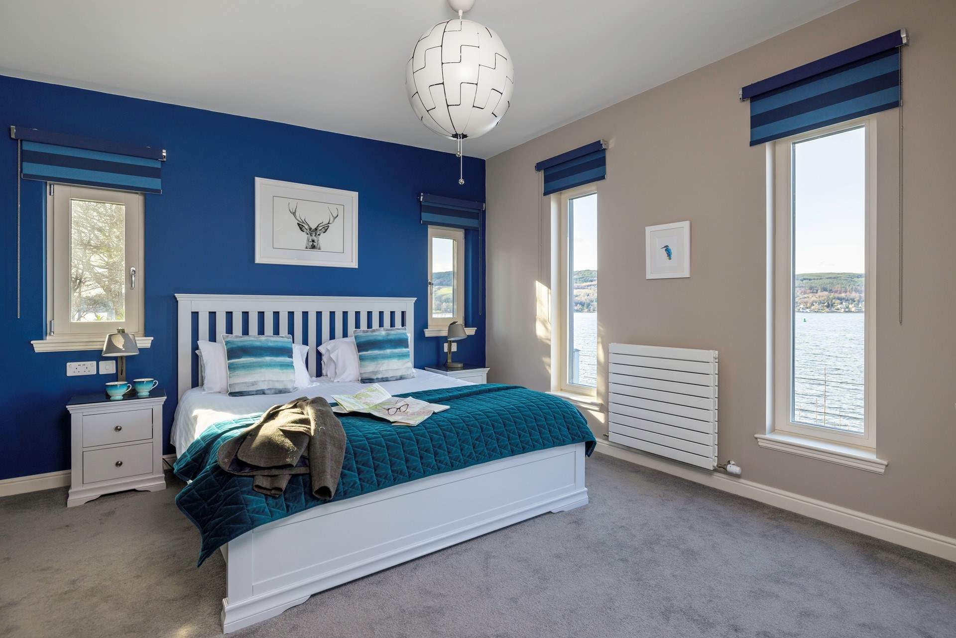 Step into the spacious bedroom with stunning views in every direction.