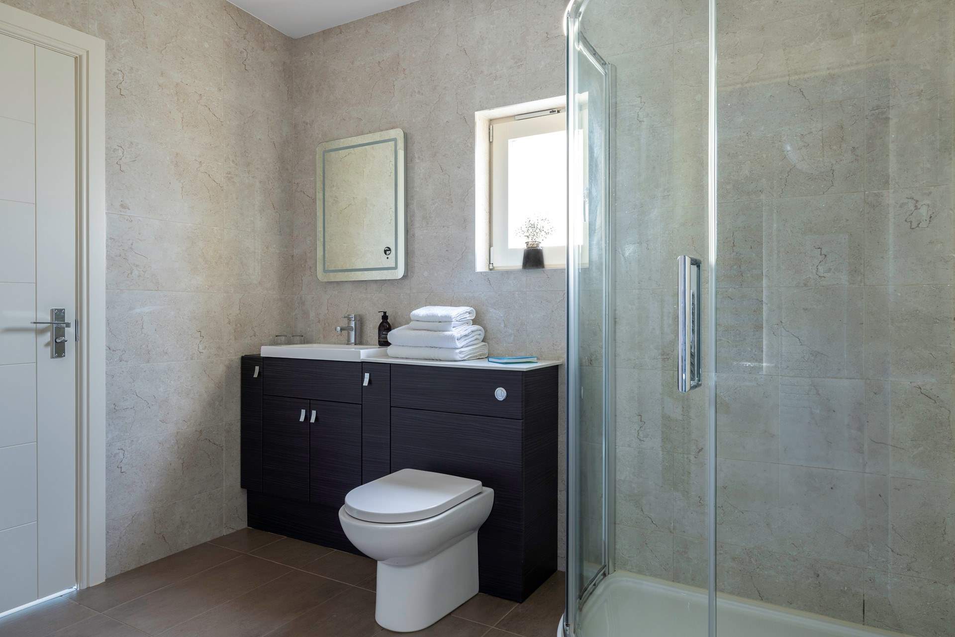 Enjoy the spacious dual access shower-room.