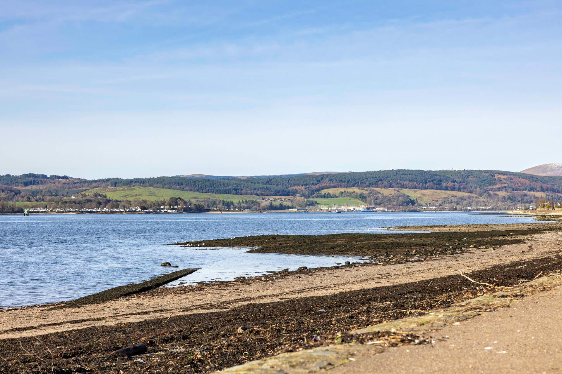 Take a stroll on the beach when the tide is out.