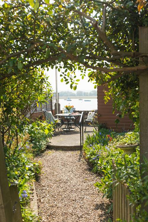 Head up the path and be ready to be wowed by the magical waterside view.