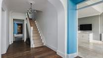 Climb the stairs to the four charming bedrooms on the first floor. 