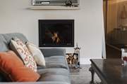 Snuggle up in front of the wood-burner after a busy day exploring.