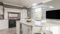 Perch at the breakfast-bar and chat with the chef. 