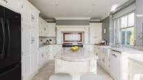 The stylish kitchen has all the equipment you'll need to create a culinary masterpiece. 