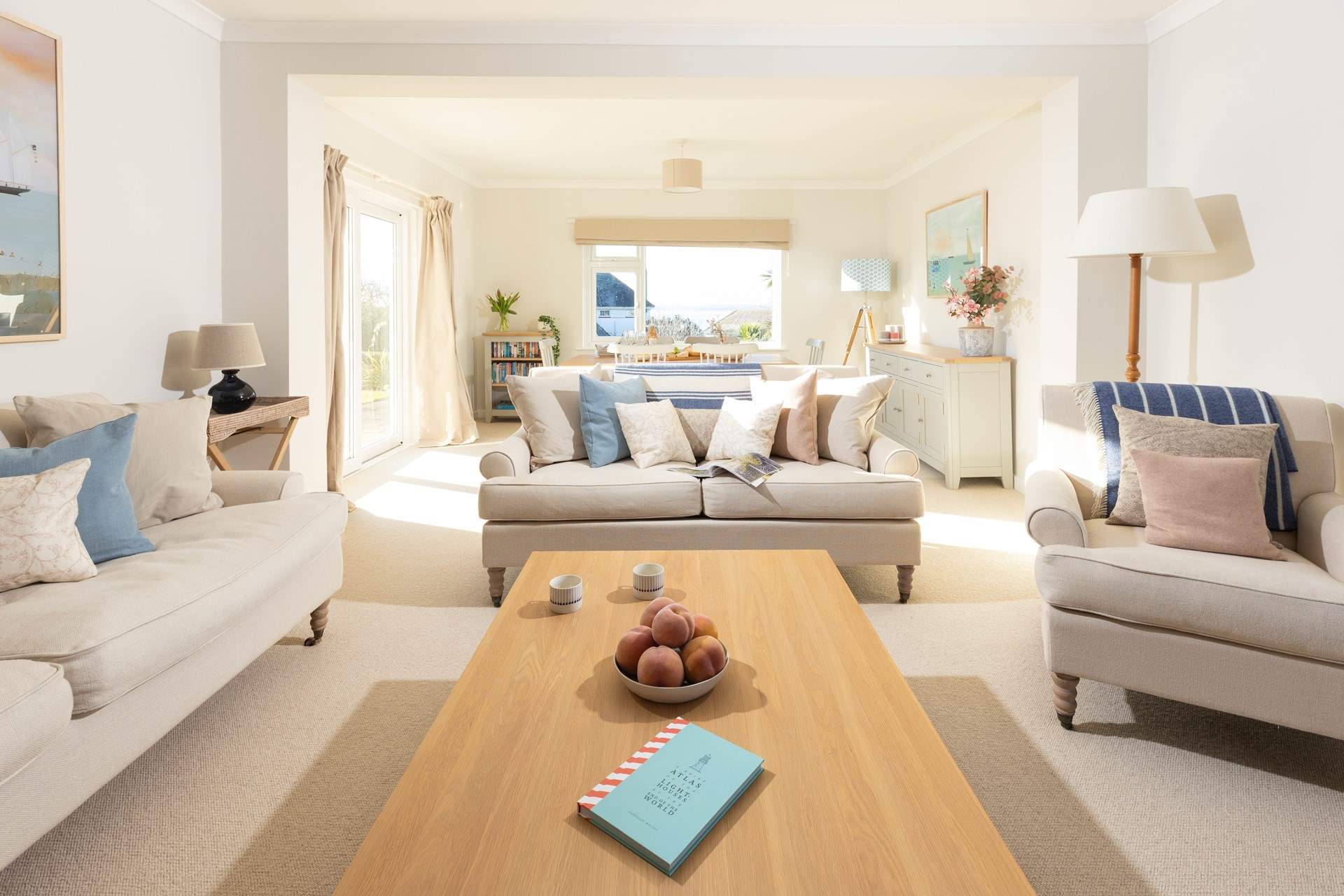The sitting/dining-room is light and airy. 