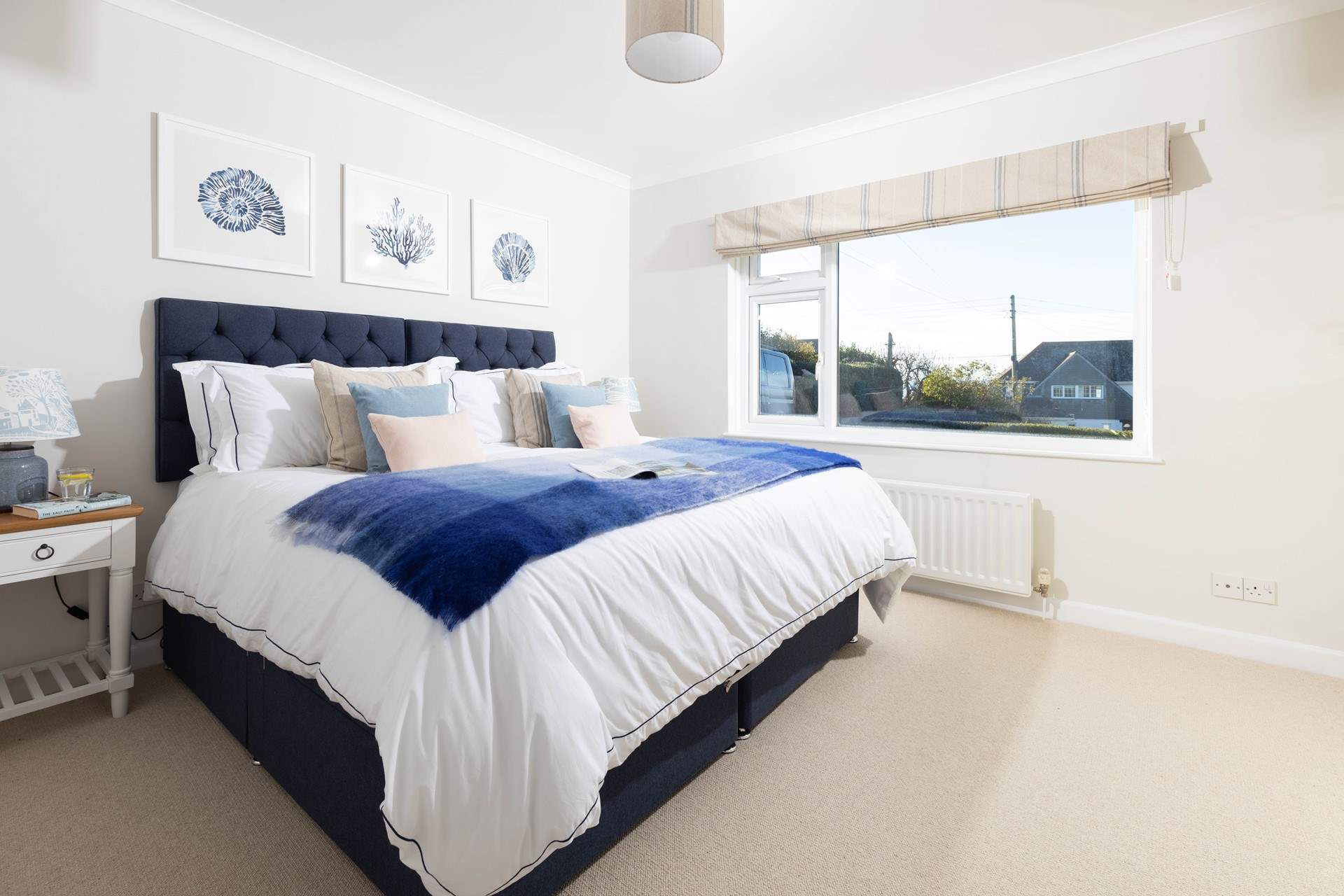 Bedroom 1 has a super-king double bed with calming furnishings. 