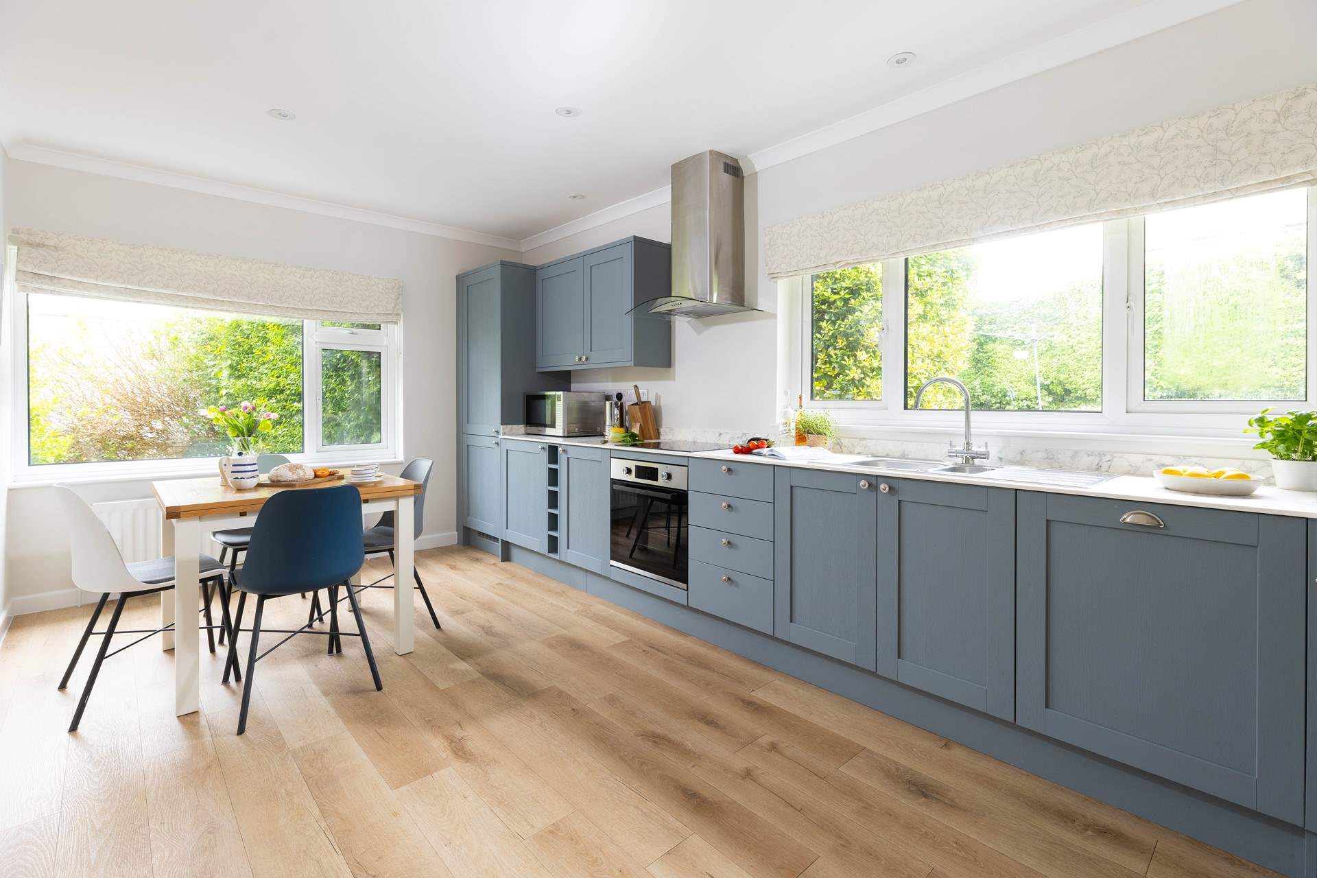 The stylish kitchen/diner with the table located on the left-hand side.