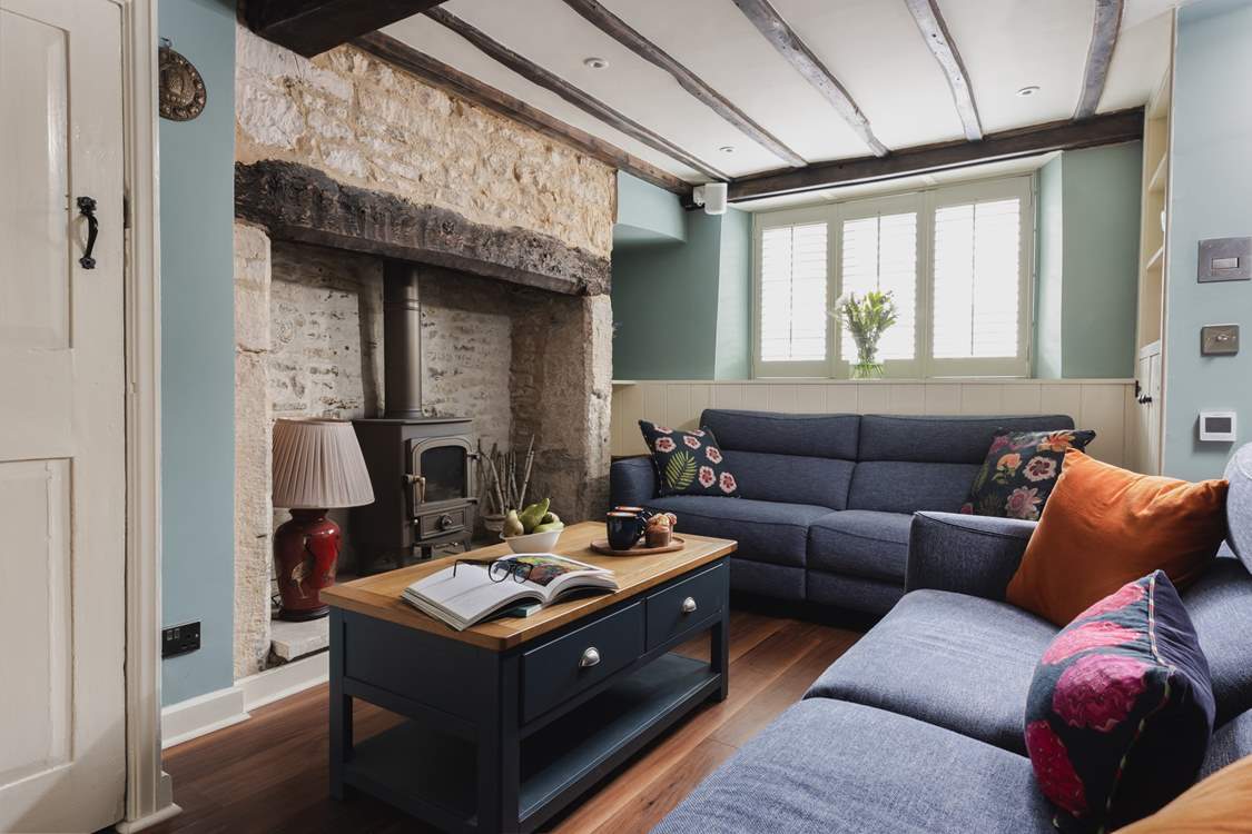 Original features marry seamlessly with cosy furnishings (please note the wood-burner is ornamental only).