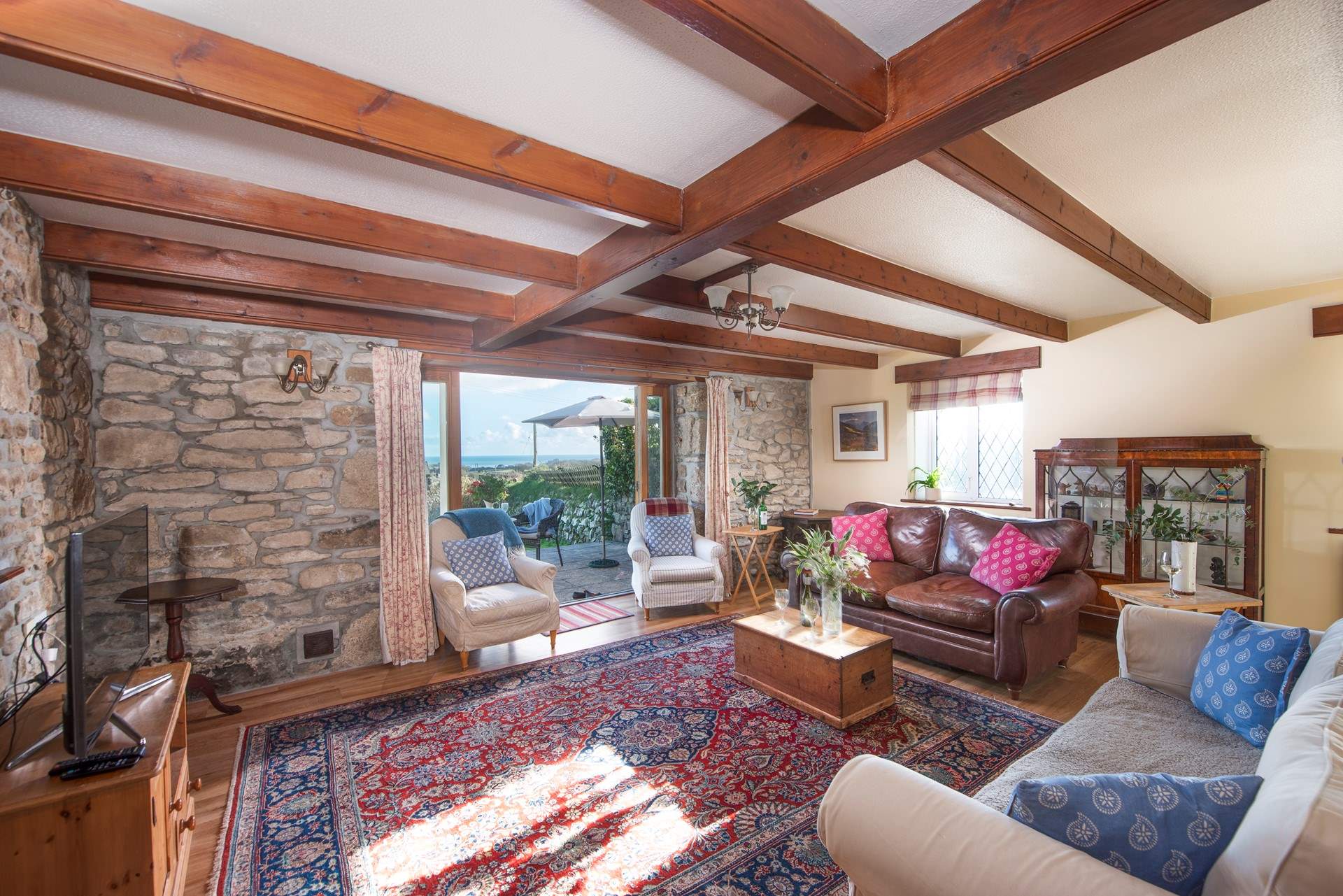 Sink into the large comfy sofas in the sitting-room.