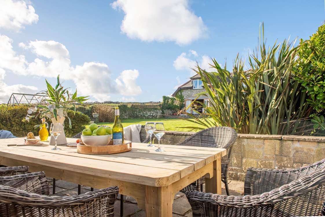 You're sure to be spending plenty of time outside with a choice of places to unwind in the sunshine.