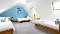 The family bedroom with space for three.