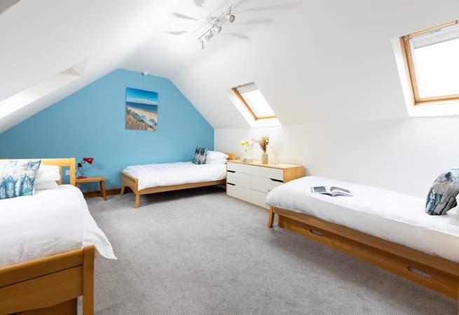 The family bedroom with space for three.