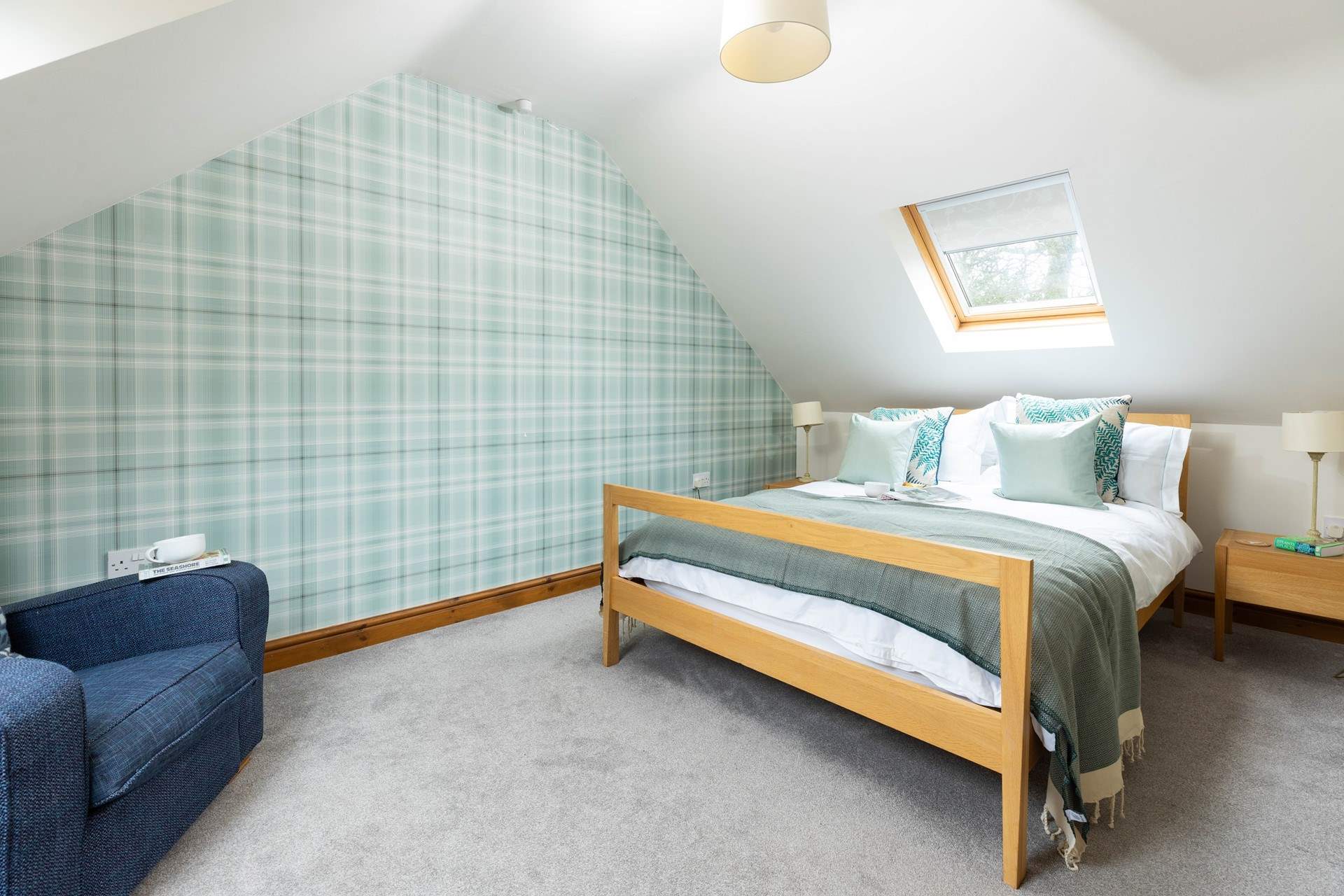 Calming pastel hues compliment quality furnishings throughout. 