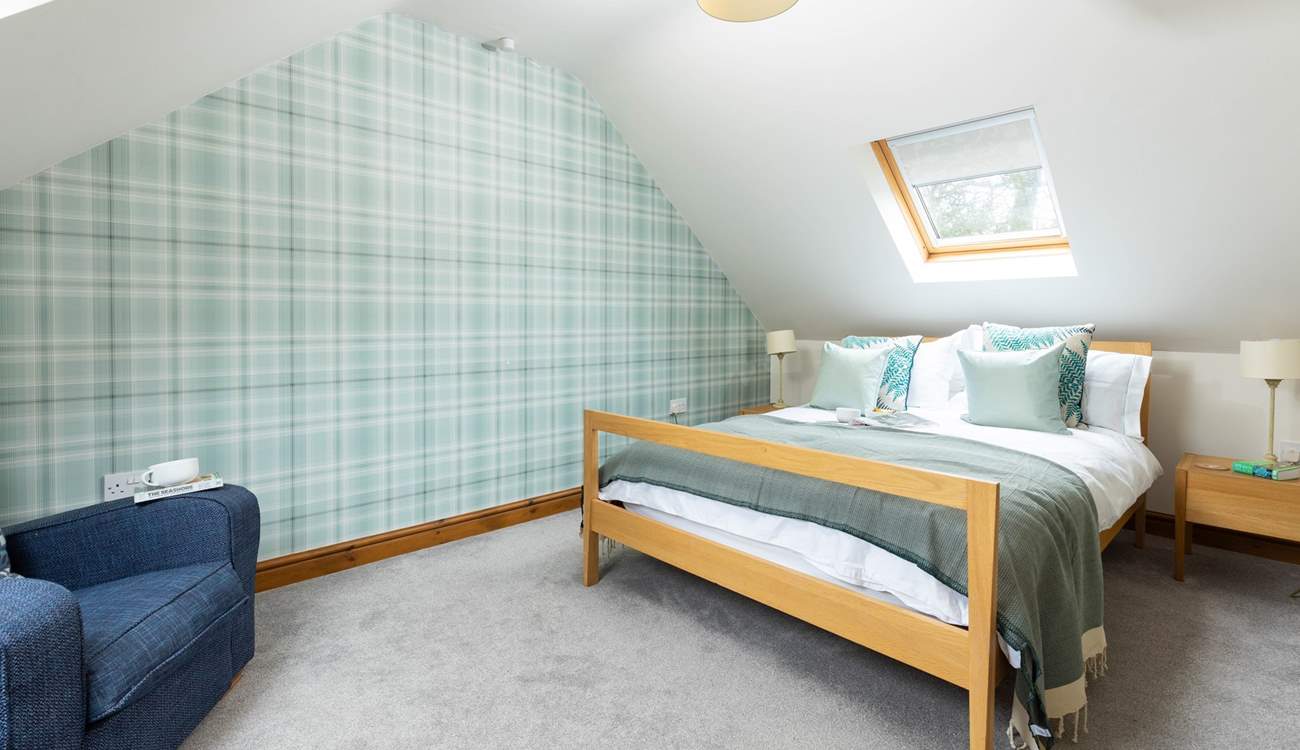 Calming pastel hues compliment quality furnishings throughout. 