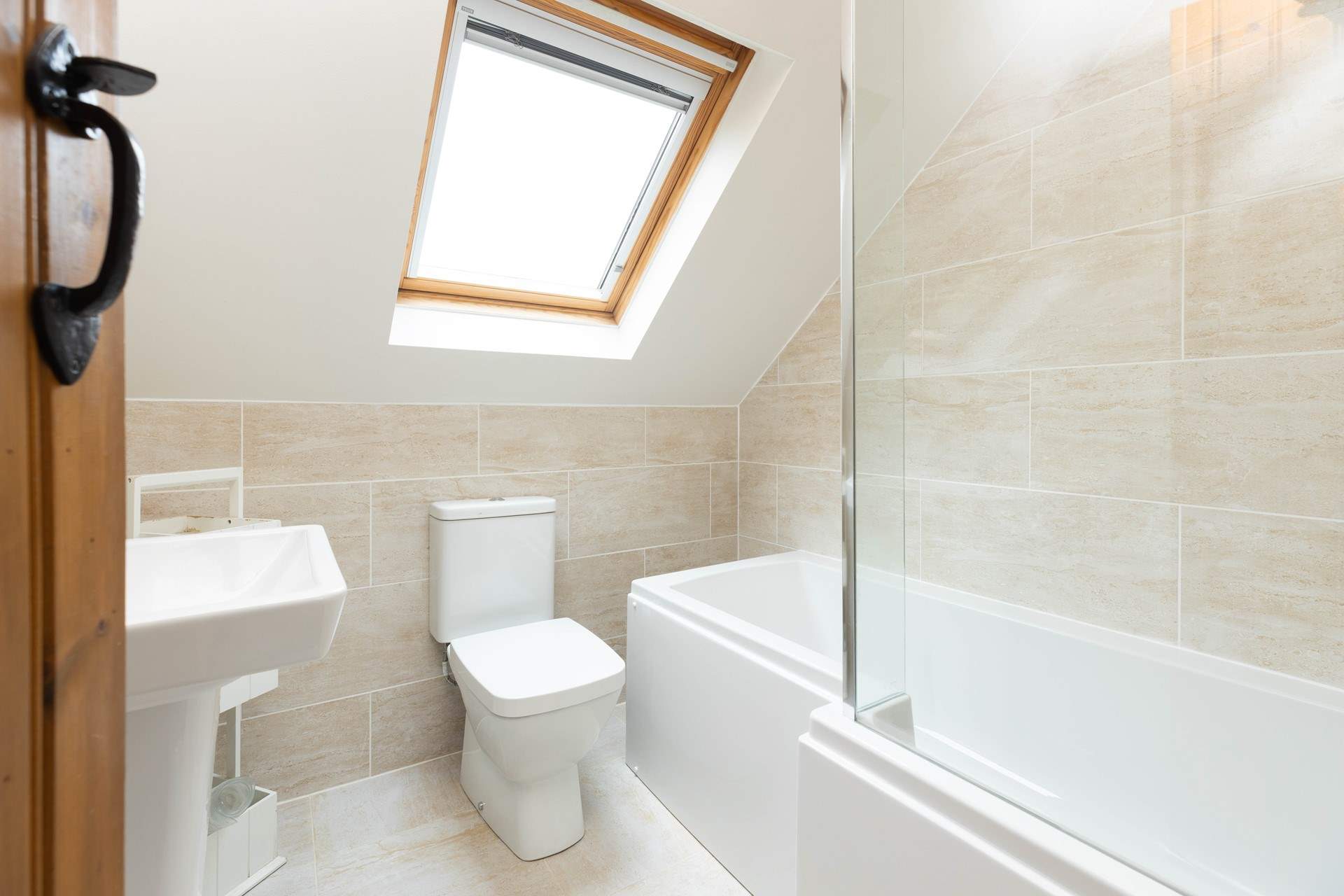 The gorgeous light filled bathroom, take a bath or shower, your choice.