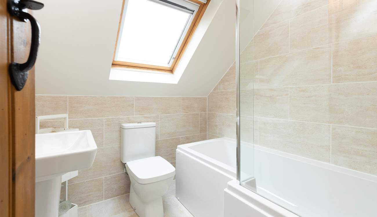 The gorgeous light filled bathroom, take a bath or shower, your choice.