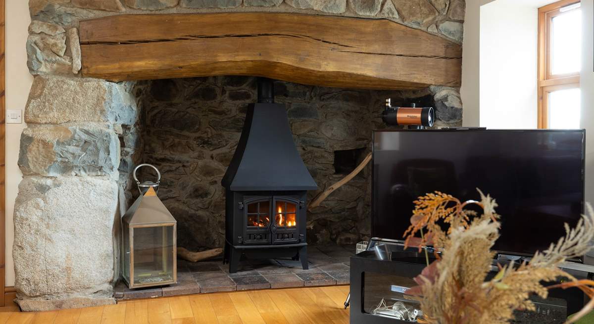 Enjoy the cosy glow from the gas stove, Plas Hufen is an ideal cottage for all seasons. 