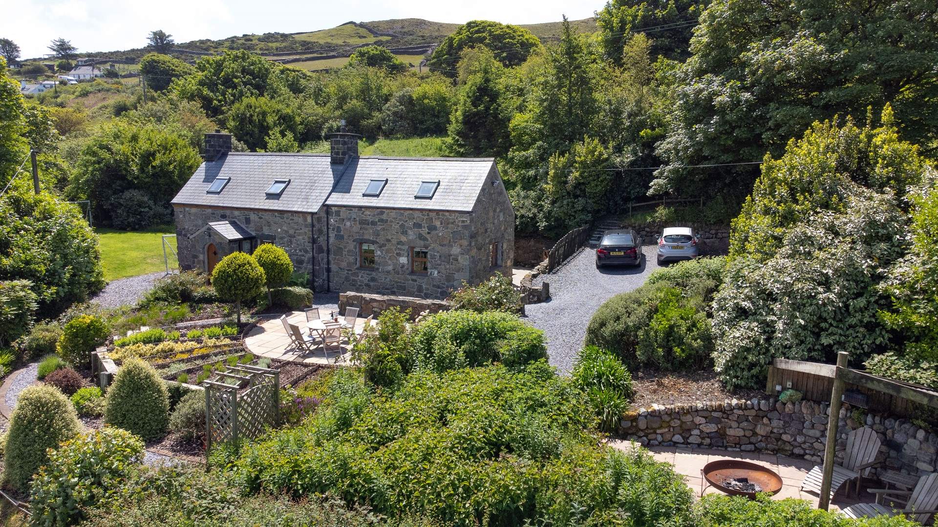 Choose this exquisite, coastal Welsh Retreat hidden in a valley with mountain views.