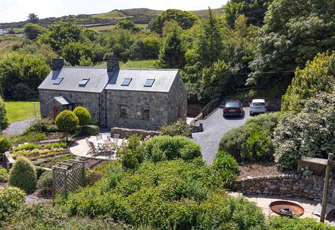 Choose this exquisite, coastal Welsh Retreat hidden in a valley with mountain views.