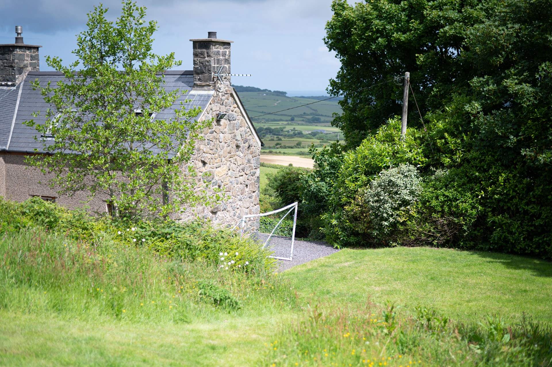 The cottage looks out over the Welsh countryside and out to sea.