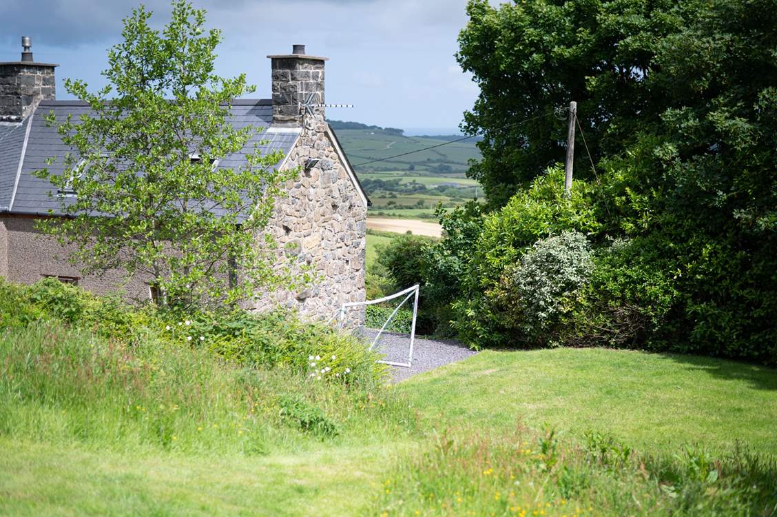 The cottage looks out over the Welsh countryside and out to sea.