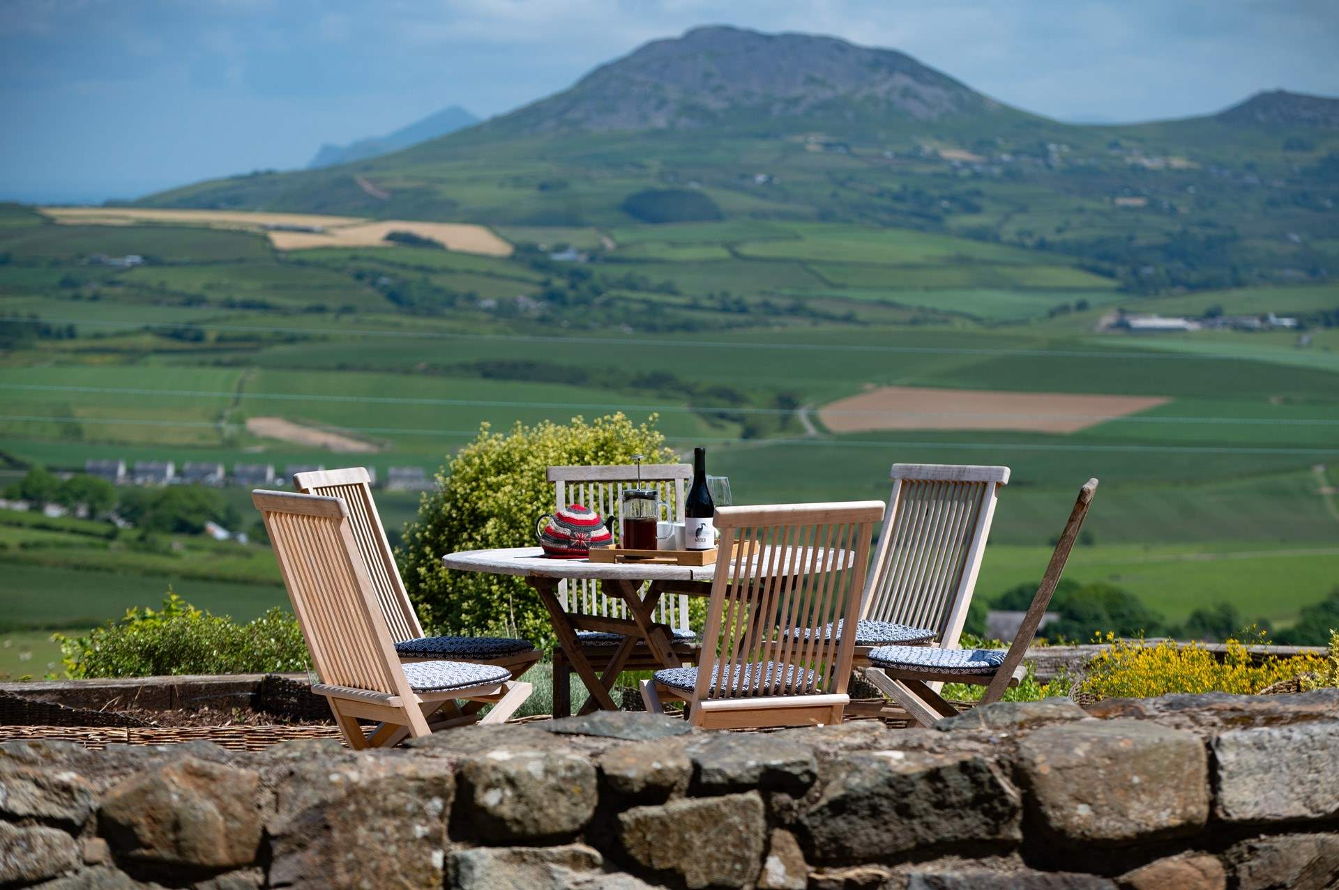 Soak up the views from this magical corner of the garden.