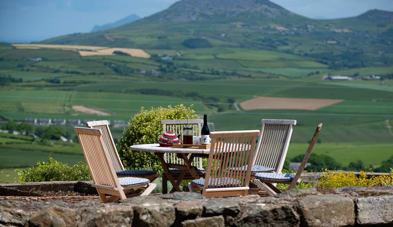 Soak up the views from this magical corner of the garden.