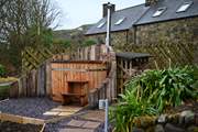 Enjoy the warming hot tub for sheer relaxation.