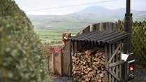 Conveniently placed log store. 