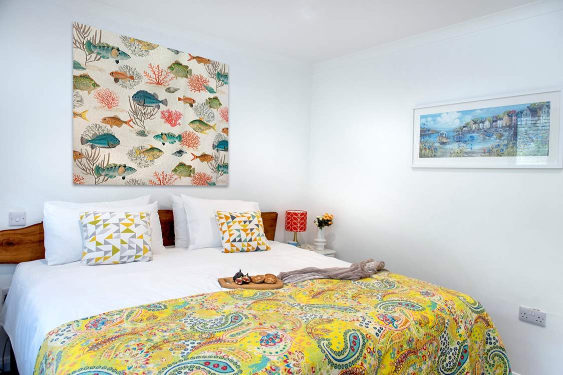 Fresh and bright decor in bedroom one.