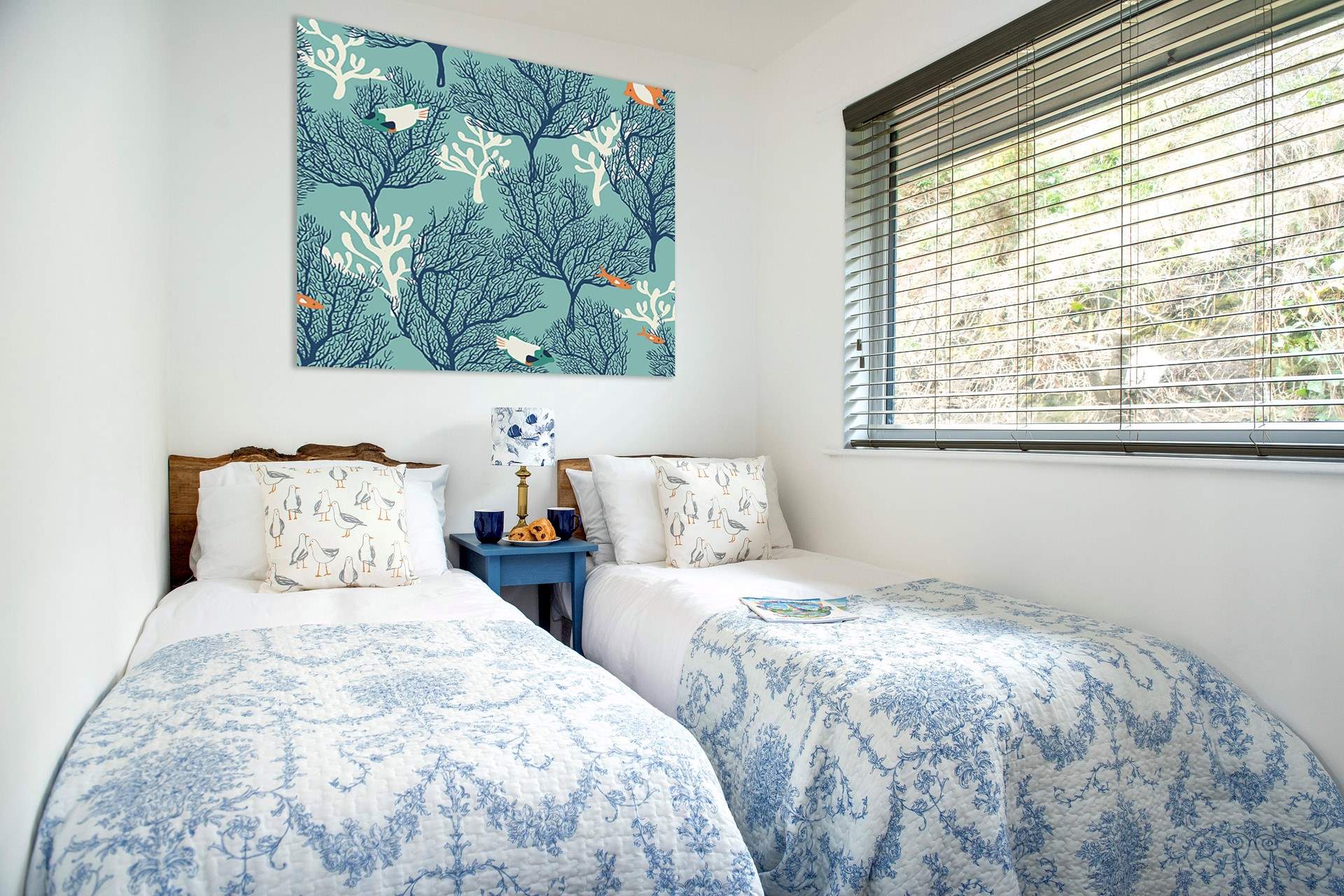 The twin-bedded room sits at the back of the lodge.