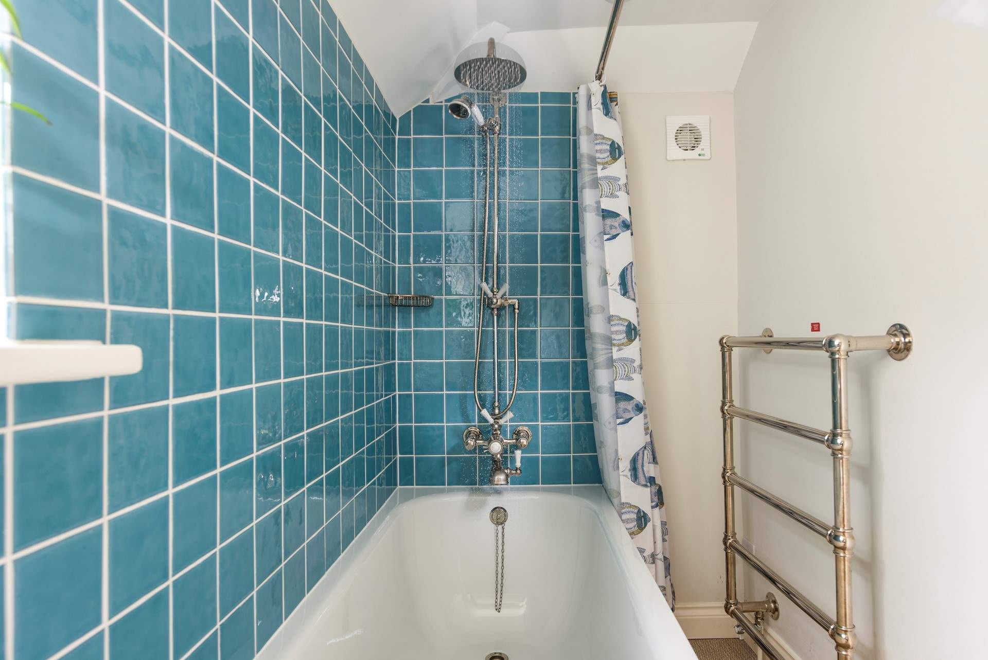 Enjoy a leisurely holiday soak in the cottage bathroom.