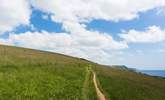 Don't forget your walking boots so you can go out and explore this beautiful area along the coastal footpath. - Thumbnail Image