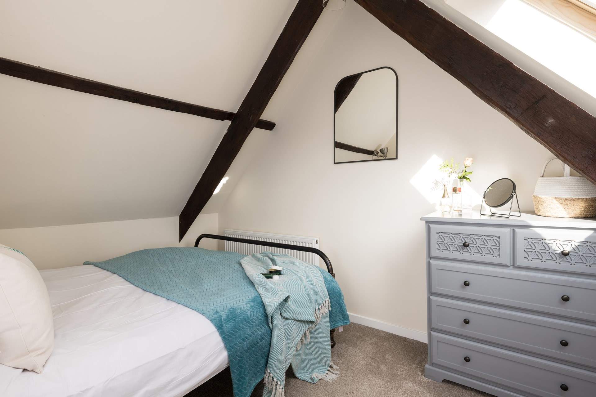 Another gorgeous bedroom with original beams.
