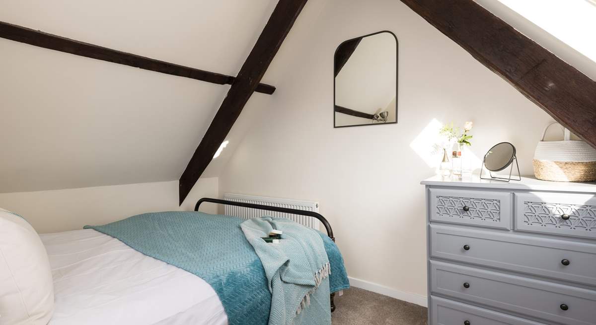 Another gorgeous bedroom with original beams.