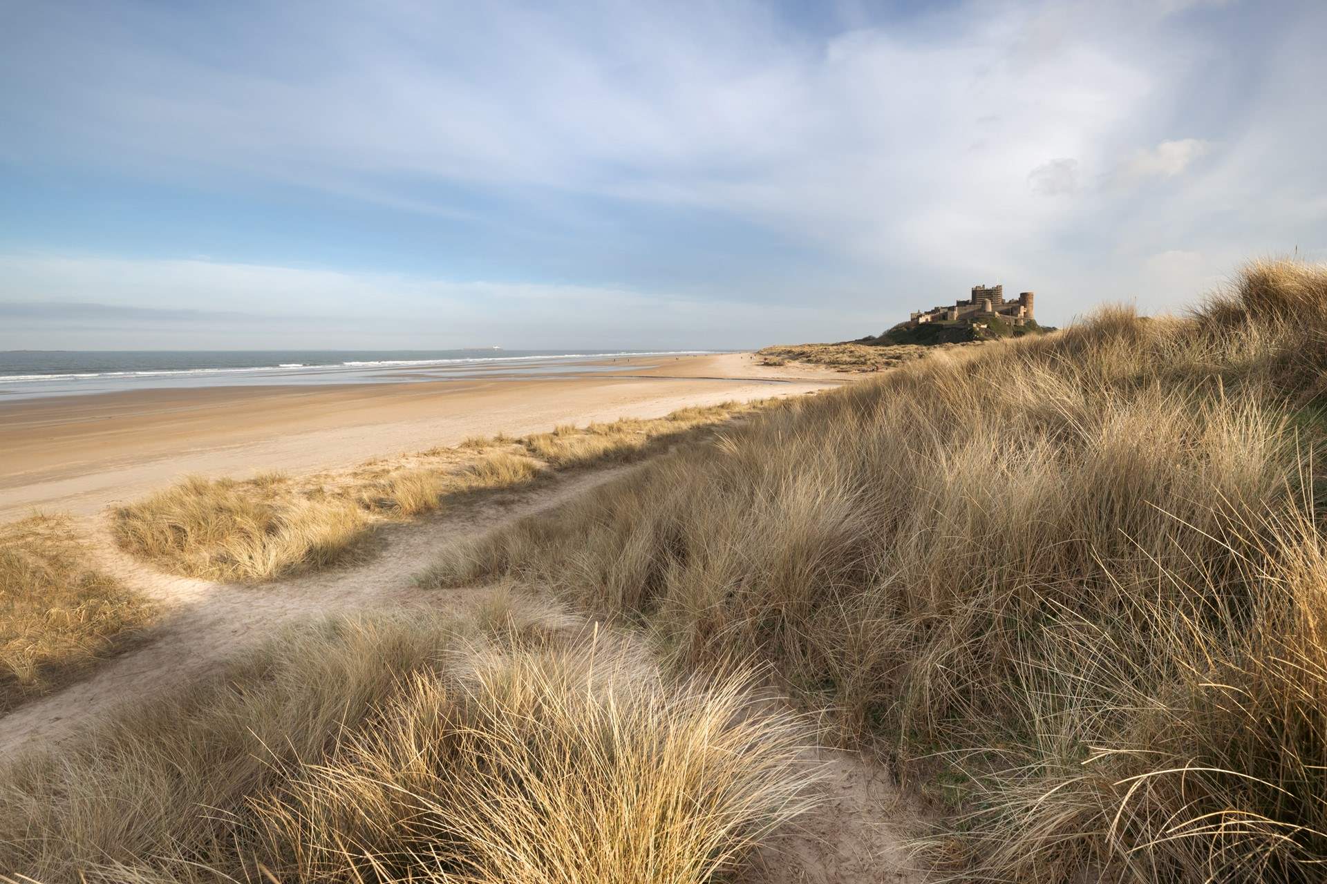 Visit historic Bamburgh Castle only five miles away.
