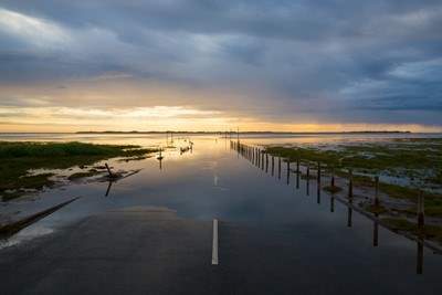 The causeway to Holy Island with receding tide.