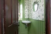 We just love the wallpaper in the downstairs cloakroom.