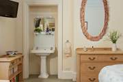There's a little vanity unit for those staying in the second bedroom.