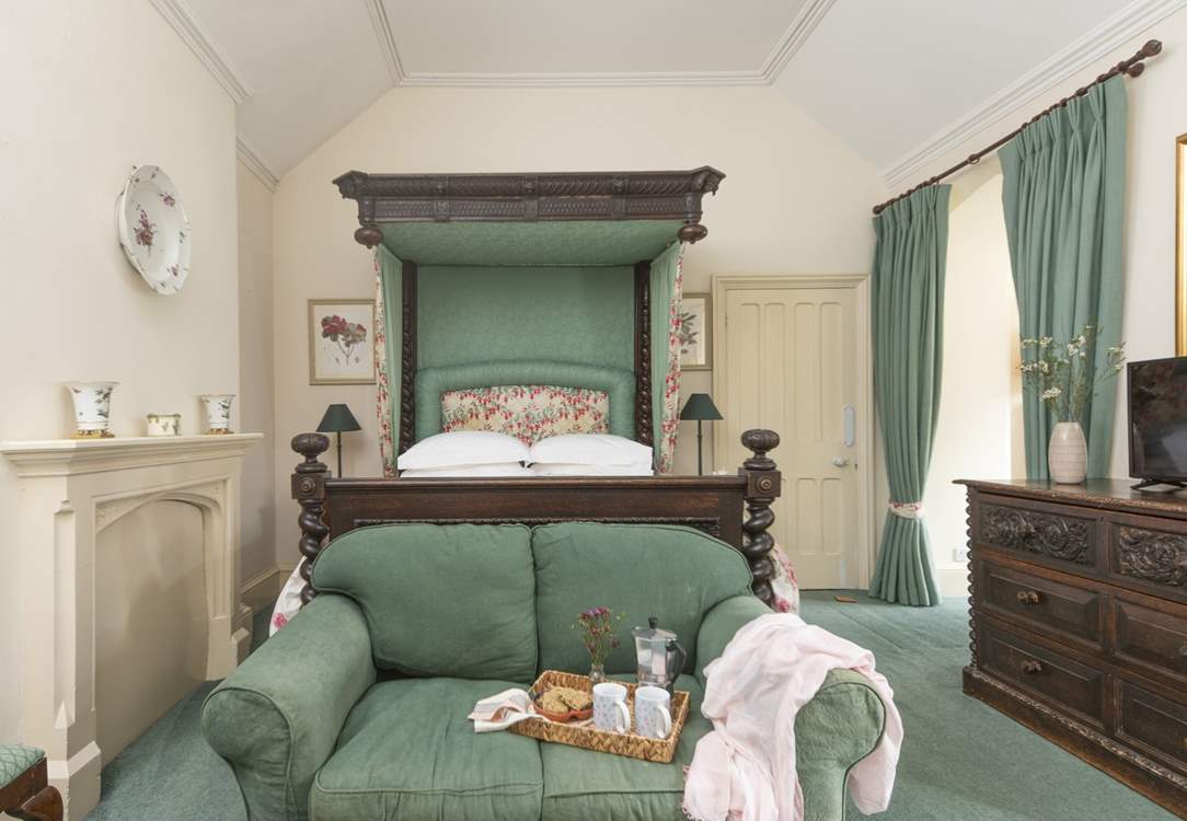 A wonderful, grand, king-size canopied bed in bedroom 3.