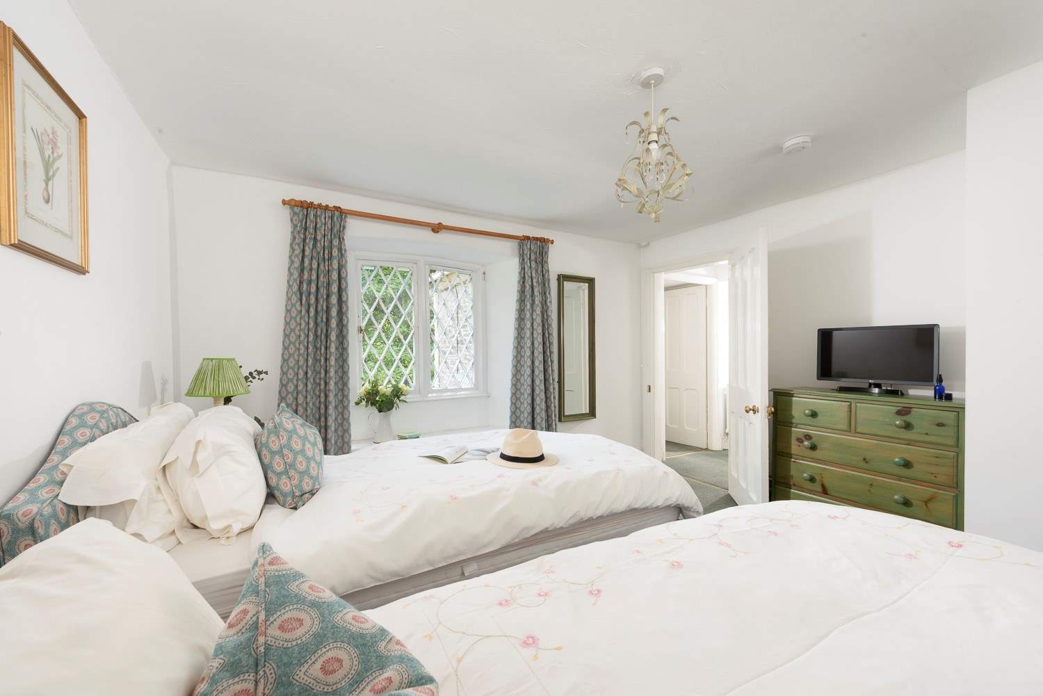 Snuggle under the covers and catch up on some TV in bed.