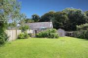 The terrace and large garden are enclosed, ideal for younger members and your four-legged friends.