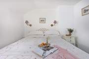 A king-size bed awaits in bedroom one.